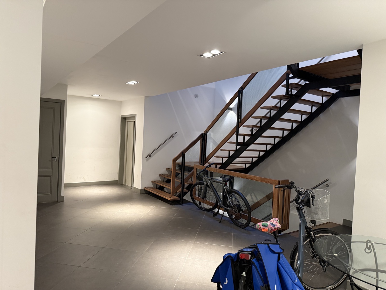 Shared lobby and staircase with bicycles